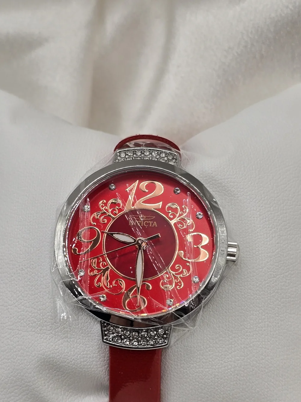 Invicta Celestial Women’s Quartz 33mm Silver Case White Dial Red Band